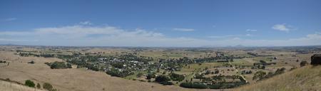 A panoramic shot from the Mount Rouse lookout, capturing the southern edge of Grampians National Park and a view of Penshurst township. Snapped on January 13th, 2021.
